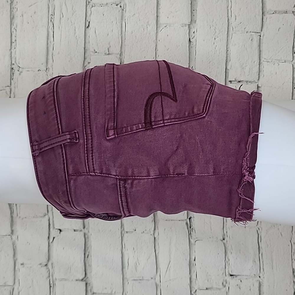 AE Next Level Low Rise Cuffed Raw Hem Cotton Denim Shortie Shorts in Burgundy - Picture 5 of 17